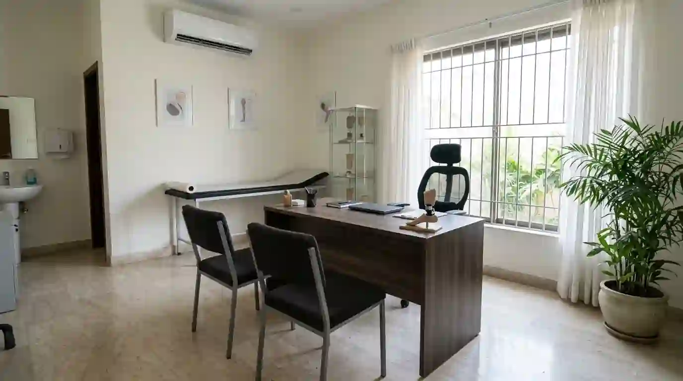 A quiet consulting room with two chairs and a desk